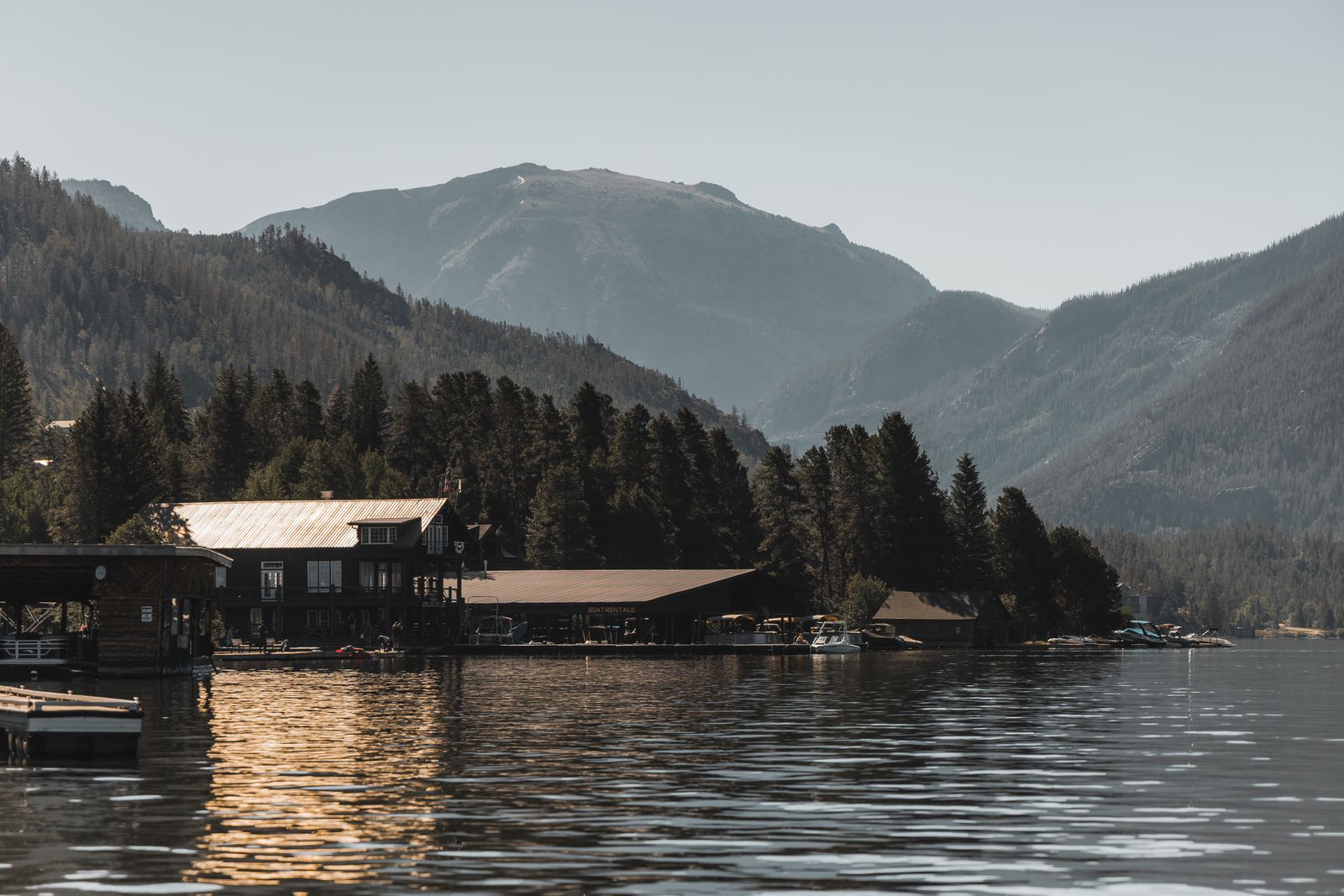 Boat rental docks on Grand Lake with mountains behind